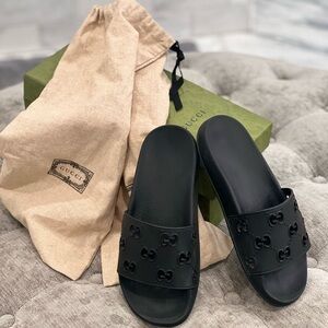 Gucci black GG slides women’s